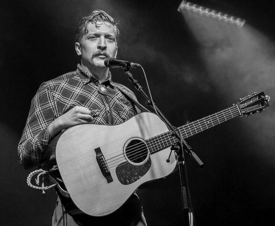 Black and White photograph by Willa Stein of singer songwriter Tyler Childers performing at Merlefest