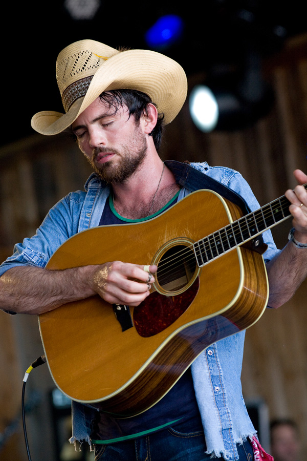 Color Photograph by Willa Stein of Scott Avett playing guitar at Merlefest