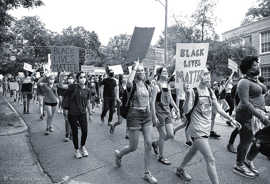 BLM march down Boylan Avenue, Raleigh, NC. Photo by Willa Stein